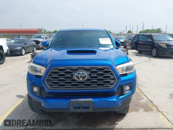 2018 Toyota Tacoma SR5 z VIN 5TFAZ5CN2JX064452, wystawiony jako IAAI lot #41945468 z przebiegiem 132 450 mil mil oraz . Historia ofert i sprzedaży dostępna na DreamBid. Obrazek 12.