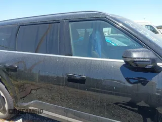2024 Kia EV9 Land z VIN KNDADFS59R6035988, wystawiony jako IAAI lot #42076672 z przebiegiem 10 316 mil mil oraz . Historia ofert i sprzedaży dostępna na DreamBid. Obrazek 14.