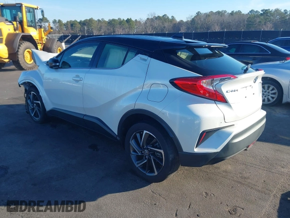 2021 Toyota C-HR LE with VIN JTNKHMBXXM1105546, listed as a IAAI auction lot 41486068 with 87,099 mi miles. Bid and sale history available at carsss.com. Image 3.