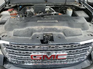 2011 GMC Sierra 2500HD Denali z VIN 1GT125C81BF106180, wystawiony jako Copart lot #55342435 z przebiegiem 174 738 mil mil oraz Szkoda całkowita • Salvage title. Historia ofert i sprzedaży dostępna na DreamBid. Obrazek 11.