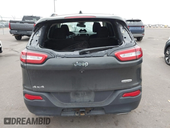 2015 Jeep Cherokee Latitude with VIN 1C4PJMCS2FW755219, listed as a IAAI auction lot 41830715 with 113,097 mi miles. Bid and sale history available at carsss.com. Image 16.