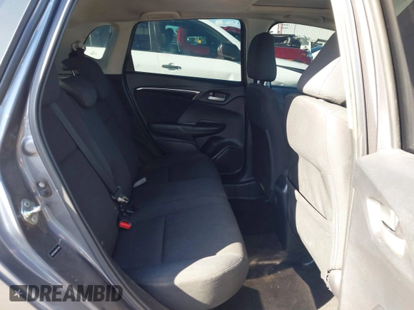 2015 Honda Fit EX-L z VIN 3HGGK5H89FM774299, wystawiony jako IAAI lot #41793448 z przebiegiem 142 228 mil mil oraz . Historia ofert i sprzedaży dostępna na DreamBid. Obrazek 8.