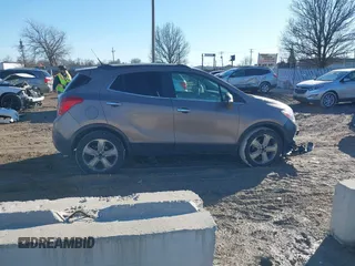 2014 Buick Encore Convenience with VIN KL4CJBSB5EB742534, listed as a IAAI auction lot 41655547 with 63,199 mi miles and . Bid and sale history available at DreamBid. Image 13.