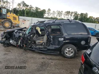 2003 GMC Yukon SLT with VIN 1GKEC13Z03R244247, listed as a Copart auction lot 65952894 with 0 mi miles and Salvage Title. Bid and sale history available at carsss.com. Image 2.