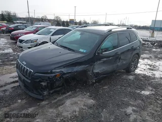 2019 Jeep Cherokee Latitude Plus with VIN 1C4PJMLB2KD104694, listed as a IAAI auction lot 41211741 with 54,386 mi miles. Bid and sale history available at carsss.com. Image 18.