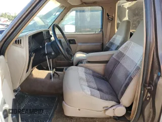 1990 Ford Bronco z VIN 1FMCU14T4LUA75868, wystawiony jako Copart lot #74209254 z przebiegiem 828 308 mil mil oraz Szkoda całkowita • Salvage title. Historia ofert i sprzedaży dostępna na DreamBid. Obrazek 7.