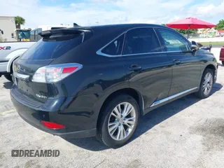 2010 Lexus RX 450h with VIN JTJZB1BAXA2002631, listed as a IAAI auction lot 42744998 with 118,851 mi miles and . Bid and sale history available at DreamBid. Image 4.