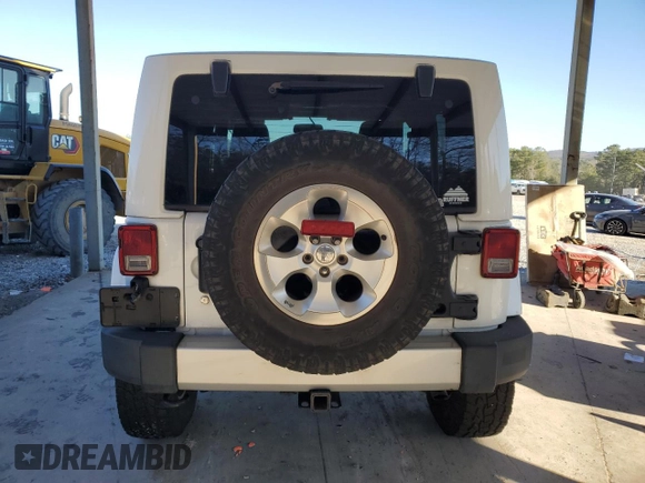 2014 Jeep Wrangler Sahara with VIN 1C4AJWBG1EL168007, listed as a Copart auction lot 87331394 with 113,228 mi miles and Salvage Title. Bid and sale history available at DreamBid. Image 6.