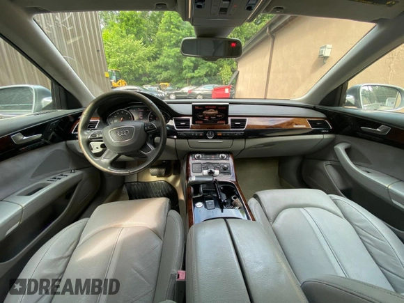 2011 Audi A8 with VIN WAURVAFD7BN018734, listed as a Copart auction lot 63735055 with 79,694 mi miles and Clean title. Bid and sale history available at DreamBid. Image 9.