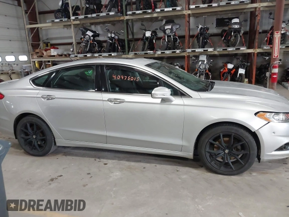 2015 Ford Fusion Titanium with VIN 3FA6P0D90FR201393, listed as a IAAI auction lot 40975015 with 131,641 mi miles. Bid and sale history available at carsss.com. Image 13.