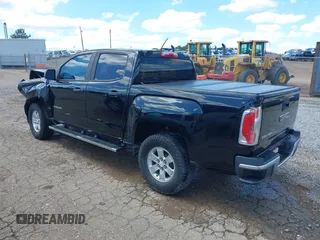 2018 GMC Canyon 2WD z VIN 1GTG5BEN9J1137949, wystawiony jako IAAI lot #42189911 z przebiegiem 98 296 mil mil oraz . Historia ofert i sprzedaży dostępna na DreamBid. Obrazek 3.