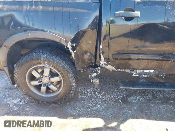 2014 Nissan Titan S with VIN 1N6AA0EC6EN506928, listed as a IAAI auction lot 41380319 with 102,669 mi miles and . Bid and sale history available at DreamBid. Image 6.