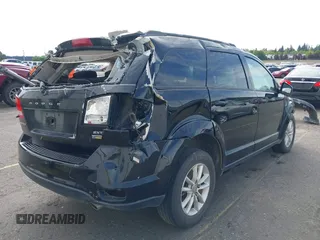 2017 Dodge Journey SXT with VIN 3C4PDCBG6HT572767, listed as a IAAI auction lot 39337554 with 159,942 mi miles and . Bid and sale history available at carsss.com. Image 4.