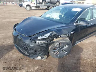 2019 Tesla Model 3 Long Range with VIN 5YJ3E1EB5KF414748, listed as a IAAI auction lot 41778914 with 0 mi miles. Bid and sale history available at carsss.com. Image 6.