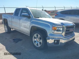 2015 GMC Sierra 1500 SLE z VIN 1GTV2UEC2FZ333119, wystawiony jako IAAI lot #41722153 z przebiegiem 100 694 mil mil oraz . Historia ofert i sprzedaży dostępna na DreamBid. Obrazek 1.