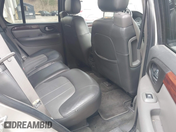 2004 GMC Envoy SLE with VIN 1GKDS13S442350938, listed as a IAAI auction lot 41790810 with 161,998 mi miles. Bid and sale history available at carsss.com. Image 8.