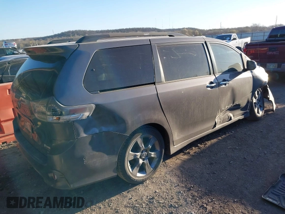 2014 Toyota Sienna SE with VIN 5TDXK3DC1ES462473, listed as a IAAI auction lot 41811437 with 209,704 mi miles and . Bid and sale history available at DreamBid. Image 4.