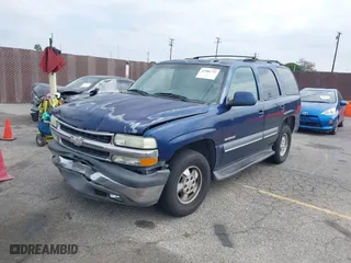 2003 Chevrolet Tahoe LS with VIN 1GNEC13T73R263893, listed as a IAAI auction lot 41906772 with 211,759 mi miles. Bid and sale history available at carsss.com. Image 2.