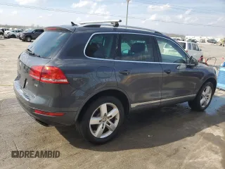 2011 Volkswagen Touareg Sport with VIN WVGFF9BPXBD005821, listed as a Copart auction lot 49391505 with 111,938 mi miles and Salvage Title. Bid and sale history available at DreamBid. Image 3.