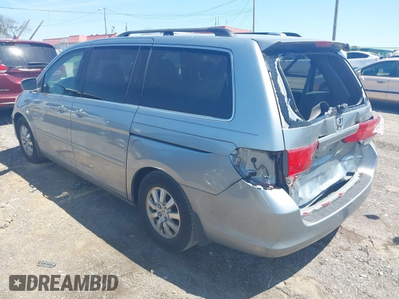 2010 Honda Odyssey EX-L with VIN 5FNRL3H62AB001954, listed as a IAAI auction lot 42028959 with 142,743 mi miles. Bid and sale history available at carsss.com. Image 3.