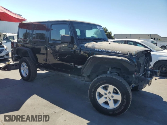 2013 Jeep Wrangler Unlimited Rubicon 10th Anniversary with VIN 1C4HJWFG4DL550832, listed as a Copart auction lot 71633684 with 60,759 mi miles and Salvage title. Bid and sale history available at DreamBid. Image 4.