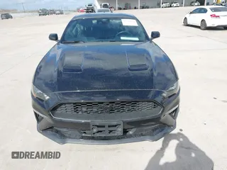 2021 Ford Mustang EcoBoost z VIN 1FA6P8TH2M5140071, wystawiony jako IAAI lot #41775674 z przebiegiem 20 184 mil mil oraz . Historia ofert i sprzedaży dostępna na DreamBid. Obrazek 12.