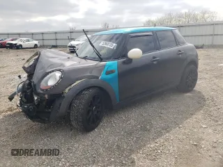 2015 MINI Hardtop 4 Door z VIN WMWXS5C59F2C63260, wystawiony jako Copart lot #52868155 z przebiegiem Nie podano mil oraz Szkoda całkowita • Salvage title. Historia ofert i sprzedaży dostępna na DreamBid. Obrazek 1.