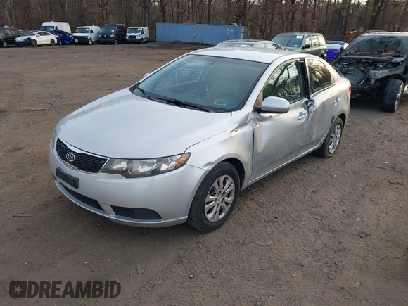 2011 Kia Forte LX with VIN KNAFT4A24B5403622, listed as a IAAI auction lot 41774093 with 143,971 mi miles. Bid and sale history available at carsss.com. Image 2.
