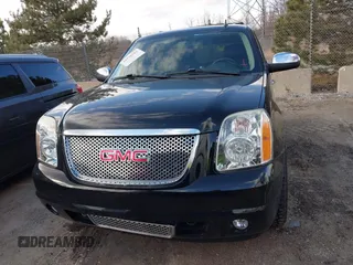2012 GMC Yukon Denali with VIN 1GKS2EEF8CR320121, listed as a IAAI auction lot 41976562 with 157,050 mi miles. Bid and sale history available at carsss.com. Image 12.