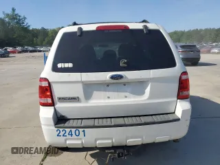 2009 Ford Escape XLS with VIN 1FMCU02719KB53740, listed as a Copart auction lot 55210035 with 144,672 mi miles and Salvage title. Bid and sale history available at DreamBid. Image 6.