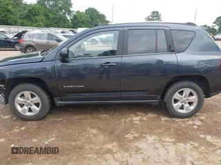 2014 Jeep Compass Sport with VIN 1C4NJCBA1ED725875, listed as a IAAI auction lot 42118863 with 133,136 mi miles. Bid and sale history available at carsss.com. Image 15.