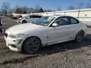2015 BMW 2 Series M235i xDrive with VIN WBA1J9C58FV371512, listed as a Copart auction lot 73705142 with 111,248 mi miles and . Bid and sale history available at carsss.com. Image 1.