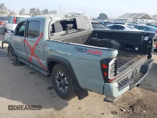 2022 Toyota Tacoma SR with VIN 3TYCZ5AN2NT096491, listed as a IAAI auction lot 42093897 with 47,041 mi miles and . Bid and sale history available at DreamBid. Image 3.
