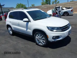 2013 Volkswagen Tiguan SE with VIN WVGAV7AX8DW544688, listed as a IAAI auction lot 42327850 with Not provided miles and . Bid and sale history available at DreamBid. Image 1.