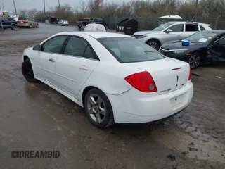 2010 Pontiac G6 1SB z VIN 1G2ZA5E06A4155211, wystawiony jako IAAI lot #41945370 z przebiegiem 208 880 mil mil oraz . Historia ofert i sprzedaży dostępna na DreamBid. Obrazek 3.