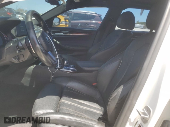 2018 BMW 5 Series 540i with VIN WBAJE5C58JWA96615, listed as a Copart auction lot 56117205 with 87,211 mi miles and Salvage title. Bid and sale history available at DreamBid. Image 7.