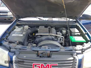 2004 GMC Envoy SLE with VIN 1GKDT13S242391968, listed as a IAAI auction lot 42079420 with 234,611 mi miles. Bid and sale history available at carsss.com. Image 10.
