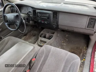 2001 Dodge Dakota z VIN 1B7GL22X41S256594, wystawiony jako Copart lot #43012935 z przebiegiem 217 179 mil mil oraz Szkoda całkowita • Salvage title. Historia ofert i sprzedaży dostępna na DreamBid. Obrazek 8.