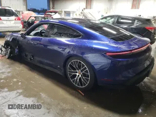 2021 Porsche Taycan z VIN WP0AA2Y13MSA14773, wystawiony jako Copart lot #69774042 z przebiegiem 15 465 mil mil oraz . Historia ofert i sprzedaży dostępna na DreamBid. Obrazek 2.