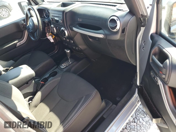 2015 Jeep Wrangler Sahara z VIN 1C4AJWBG8FL513650, wystawiony jako Copart lot #54578075 z przebiegiem 38 043 mil mil oraz Nie do naprawy • Non repairable. Historia ofert i sprzedaży dostępna na DreamBid. Obrazek 8.