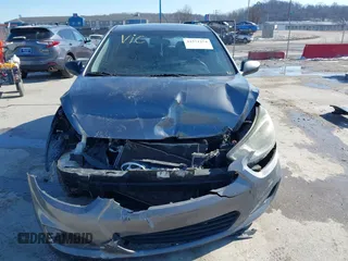 2014 Hyundai Accent GS with VIN KMHCT5AE9EU151393, listed as a IAAI auction lot 41571254 with 163,092 mi miles. Bid and sale history available at carsss.com. Image 13.