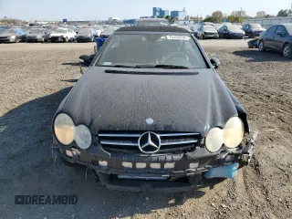 2006 Mercedes-Benz CLK 5.0L with VIN WDBTK75G06T059285, listed as a Copart auction lot 75452034 with 137,742 mi miles and Salvage Title. Bid and sale history available at carsss.com. Image 5.