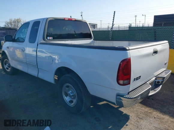 2002 Ford F-150 XL with VIN 1FTRX17292NB12320, listed as a IAAI auction lot 41904506 with 89,191 mi miles. Bid and sale history available at carsss.com. Image 3.