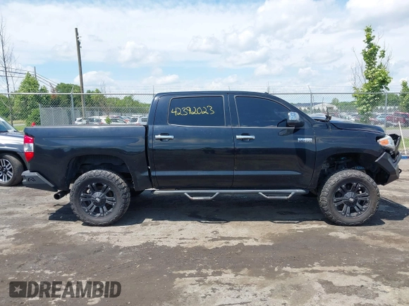 2014 Toyota Tundra Platinum with VIN 5TFAW5F15EX354983, listed as a IAAI auction lot 42392023 with 225,580 mi miles and . Bid and sale history available at DreamBid. Image 14.