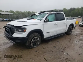 2020 Ram 1500 Rebel with VIN 1C6SRFLT9LN356100, listed as a Copart auction lot 52598835 with 103,874 mi miles and Salvage title. Bid and sale history available at DreamBid. Image 1.