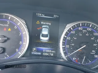 2015 Infiniti Q50 Premium z VIN JN1BV7AR9FM416956, wystawiony jako IAAI lot #41149753 z przebiegiem 81 888 mil mil oraz . Historia ofert i sprzedaży dostępna na DreamBid. Obrazek 7.