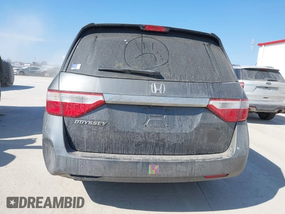 2012 Honda Odyssey EX-L with VIN 5FNRL5H69CB128585, listed as a IAAI auction lot 41695109 with 231,565 mi miles and . Bid and sale history available at carsss.com. Image 16.