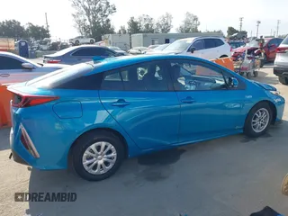 2022 Toyota Prius LE with VIN JTDKAMFP8N3209977, listed as a IAAI auction lot 42777763 with 52,995 mi miles and . Bid and sale history available at DreamBid. Image 14.