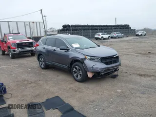 2019 Honda CR-V LX z VIN 2HKRW6H35KH212325, wystawiony jako IAAI lot #41794454 z przebiegiem 51 851 mil mil oraz . Historia ofert i sprzedaży dostępna na DreamBid. Obrazek 1.