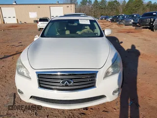 2011 Infiniti M37 with VIN JN1BY1AP5BM323915, listed as a IAAI auction lot 41822773 with 184,129 mi miles. Bid and sale history available at carsss.com. Image 12.